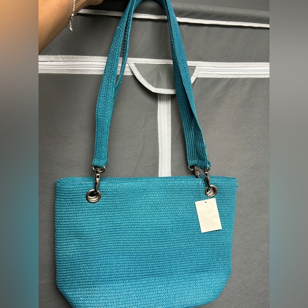 Blue woven shoulder bag with silver hardware;refer to last 2 pics minor damage.